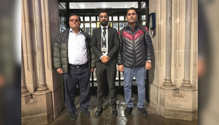 Newly elected British Parliamentarian Adnan Hussain (C) pose for group photo with former President Islamabad Chamber of Commerce and Industry and Secretary General United Business Group Zafar Bakhtawari (Left) on July 13, 2024. — APP