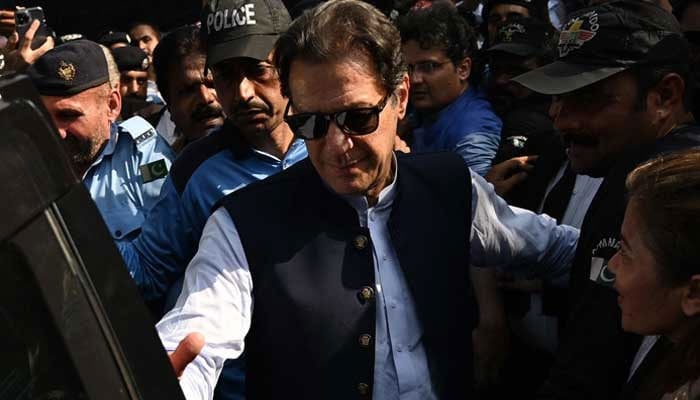 PTI founder and former prime minister Imran Khan arrives at an Islamabad court for a hearing in this undated image. —AFP/File