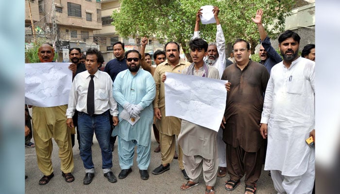 Employees of Mukhtiarkar Office are holding protest demonstration against at Hyderabad press club on July 12, 2024. — PPI