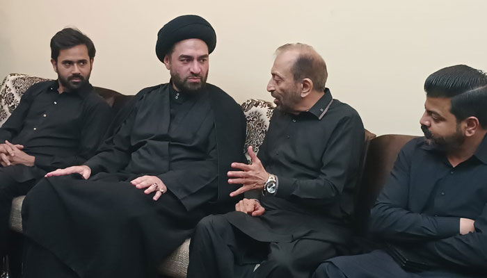 Muttahida Qaumi Movement-Pakistan senior leader Dr Farooq Sattar speaks with a religious scholar while visiting Malir on July 14, 2024. — Facebook/Dr Farooq Sattar