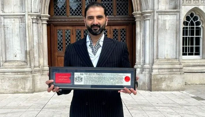 British-Pakistani entrepreneur Suleman Raza poses with Freedom of the City of London award. — Reporter