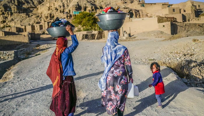 Two women and a girl child seen in this undated photo. — AFP/file