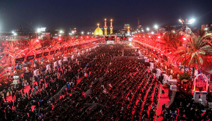 Muslim gather to attend a mourning ritual on the eve of Ashura, which commemorates the martyrdom of Prophet Mohammeds (PBUH) grandson Imam Hussein (RA), at the shrine of Imam Abu Al-Fadl al-Abbas in Iraqs central holy city of Karbala on July 15, 2024. — AFP