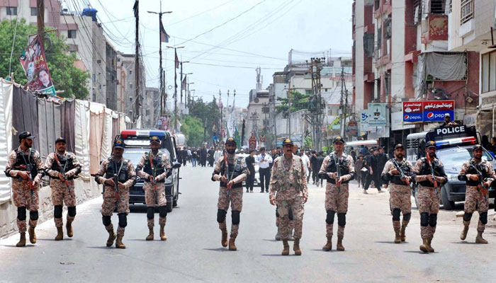 Sindh Rangers personnel patrol the streets during 9th Muharram-ul-Haram procession on July 16, 2024. — APP