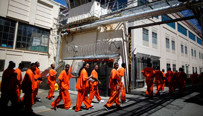 Inmates walk in San Quentin State Prison in San Quentin, California. — Reuters/File