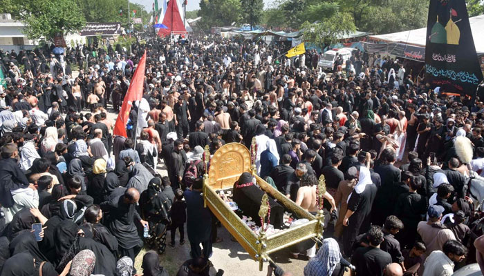 A large number of mourners attend the main procession on the 9th of Muharram ul Haram on July 16, 2024. — APP