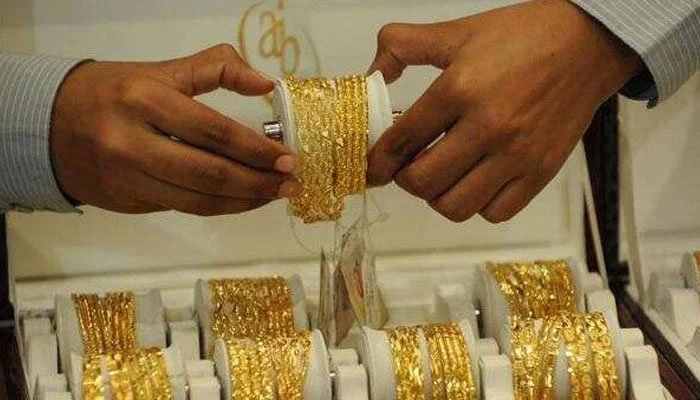 A representational image of gold bangles. — AFP/file