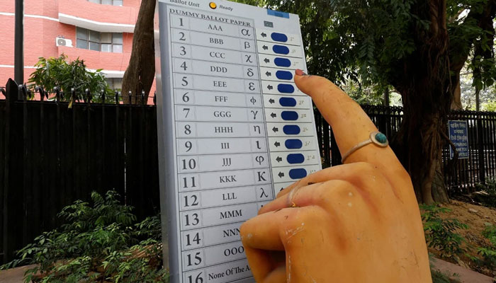 A model of Electronic Voting Machine is displayed outside the office of the Election Commission of India, ahead of the countrys general election, in New Delhi, India, April 15, 2024. — Reuters