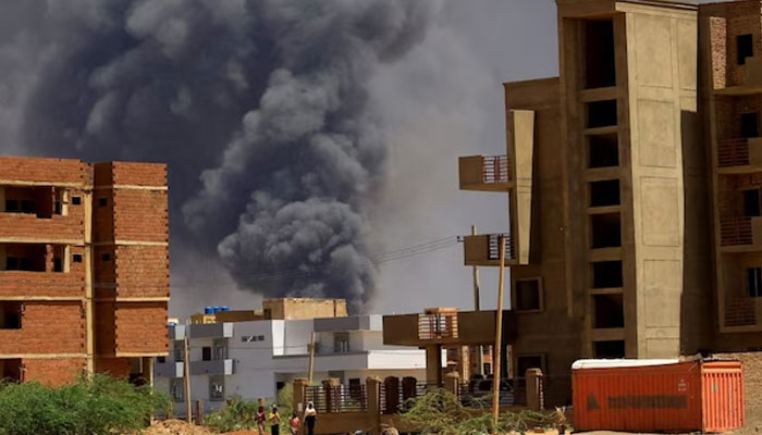 A representational image showing smoke billowing from a building in Sudan. — Reuters/File