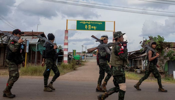 Volunteer members of Karenni insurgent forces walk in Moe Bye in Kayah State, Myanmar November 12, 2023. — Reuters