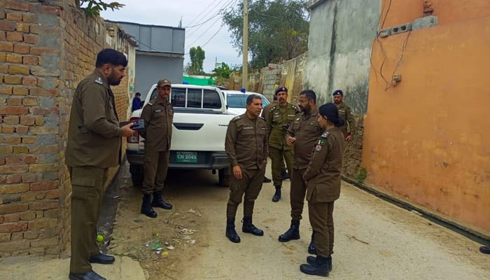 This image shows Rawalpindi Police officials interacting. — Facebook/Rawalpindi Police/File