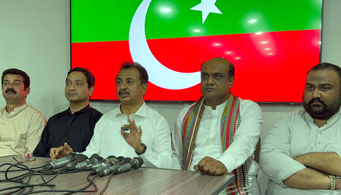 PTI Sindh President, Haleem Adil Sheikh (centre) along with Advocate Intezar Hussain Panjota, Focal Person for PTI Founding Chairman Imran Khan addresses a press conference, at Insaf House in Karachi on July 21, 2024. — PPI