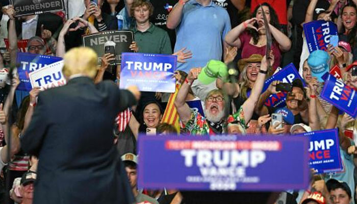 Former US President and 2024 presidential nominee Donald Trump gestures after speaking during a campaign rally with US Senator and vice presidential nominee JD Vance at Van Andel Arena in Grand Rapids, Michigan, on July 20, 2024. — AFP