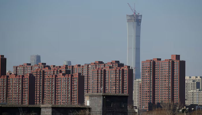 An aerial view shows unfinished residential buildings of the Gaotie Wellness City complex in Tongchuan, Shaanxi province, China September 12, 2023. — Reuters