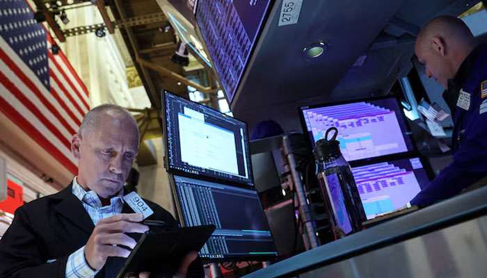 Traders work on the floor at the New York Stock Exchange (NYSE) in New York City, U.S., June 12, 2024. — Reuters