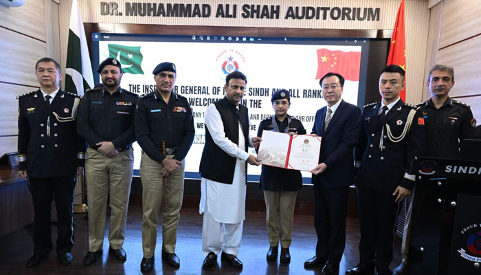 Chinese Consul General Yang Yundong (centre to right) and Sindh Home Minister Ziaul Hassan Lanjar (centre to left) present a shield to SP Suhai Aziz at a ceremony in the Central Police Office Karachi on July 22, 2024. — Facebook/Minister for Home and Law Sindh