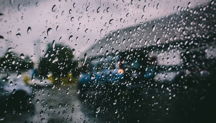 Raindrops on a glass window seen in this representational image. — Unsplash