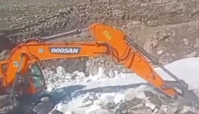 Kaghan Development Authority heavy machinery cuts glaciers for the safety of visitors on July 24, 2024. — Screengrab via Facebook/Kaghan Development Authority