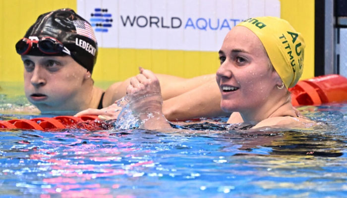 American competitive swimmer Katie Ledecky (left) and Australias swimmer Ariarne Titmus (right) seen in this image. —  AFP/file