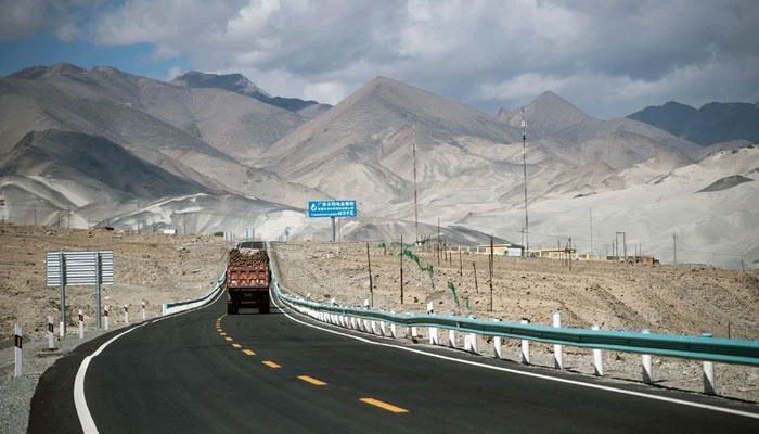 A truck drives along the China-Pakistan Friendship Highway before the Karakorum mountain range near Tashkurgan in Chinas western Xinjiang province. — AFP/File