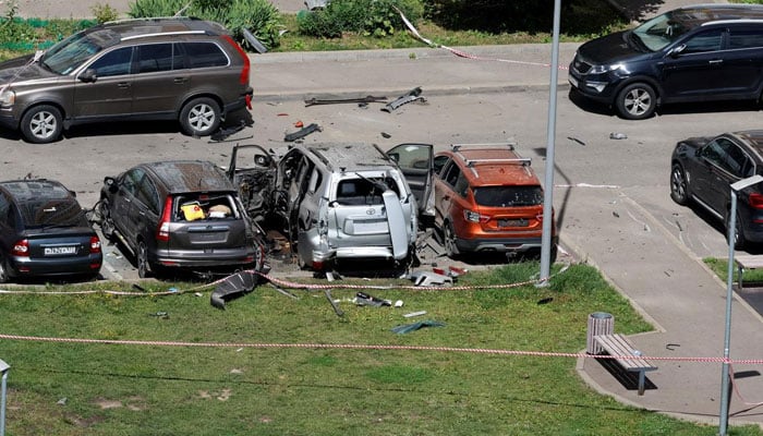 A view shows damaged cars, including a Toyota Land Cruiser, following an explosion caused by the detonation of an unidentified device, which reportedly injured an officer from Russia’s military intelligence agency in Moscow, Russia, July 24, 2024. — Reuters