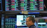 Stock markets slump on disappointing earnings