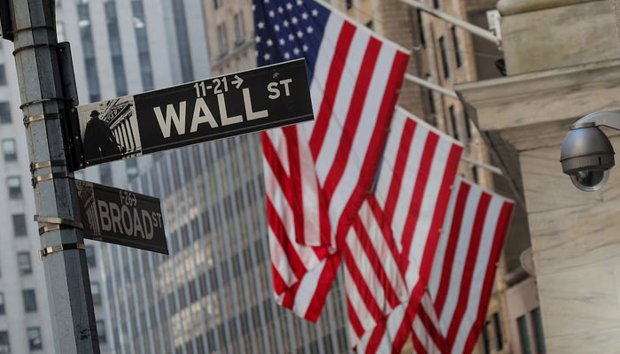 A Wall St. sign is seen outside the New York Stock Exchange (NYSE) in the financial district in New York City, U.S., March 2, 2020. — Reuters