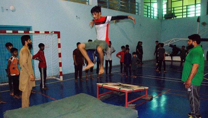 Players in action during Punjab Sports Board Coaching and Training Summer Camp 2023 at City Sports Complex. — APP/File