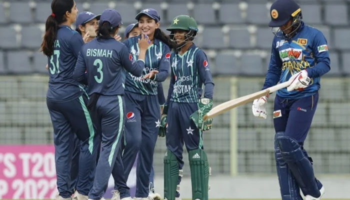 Pakistans womens cricket team players celebrating after dismissing a Sri Lankan player in this undated photo. — PCB