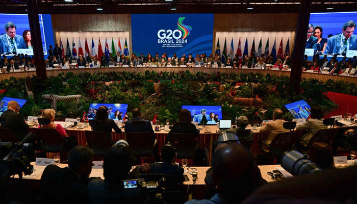 Brazil’s Finance Minister Fernando Haddad delivers a speech (on the screen) during the pre-launch of the Global Alliance Against Hunger and Poverty, in the framework of the G20 Ministerial Meeting in Rio de Janeiro, Brazil, on July 24, 2024. — AFP