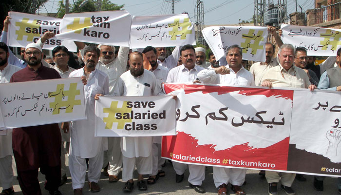 Members of the Salaried Class Alliance hold a protest demonstration against high taxes on salaried class, at the Peshawar Press Club on July 26, 2024. — PPI