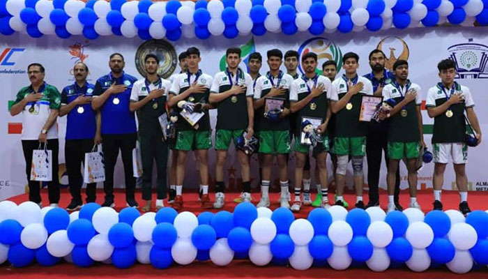 A group photo of Pakistan 19 Volleyball team. — Reporter/Faizan Lakhani/File