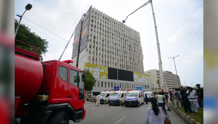 Rescue operation is underway after fire broke out incident at a multi-storey building located on Sharea Faisal in Karachi on July 26, 2024. — PPI