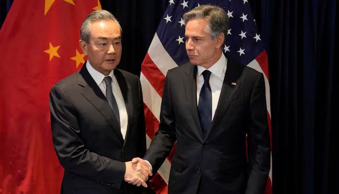 US Secretary of State Antony Blinken (right) shakes hands with Chinas FM Wang Yi. — Reuters/file