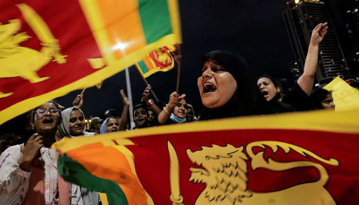 Protestors shout slogans near the Presidential Secretariat in Colombo, Sri Lanka, on  April 11 2022. — Reuters