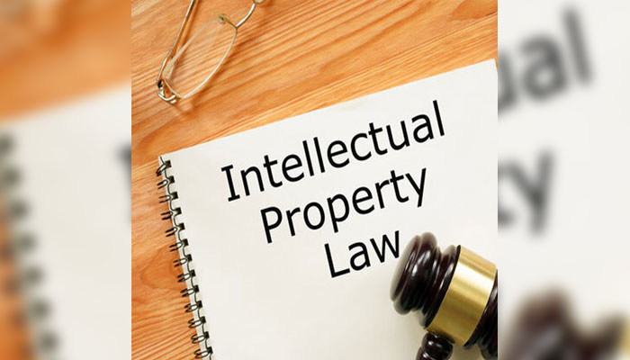 A representational image showing a gavel with a paper that reads Intellectual Property Law. — MAB Law Associates Website/File