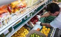 US inflation rises moderately, consumer spending cools