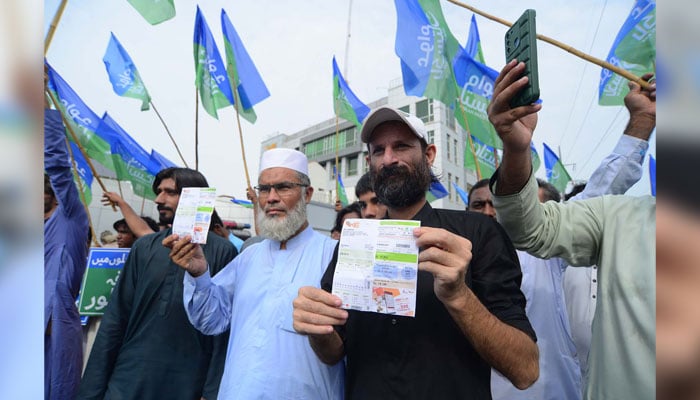 Leaders and members of Awam Pakistan Party hold protest demonstration against price hiking and the highly inflated electricity bills, outside KE Head-Office building in Karachi on July 28, 2024. — PPI