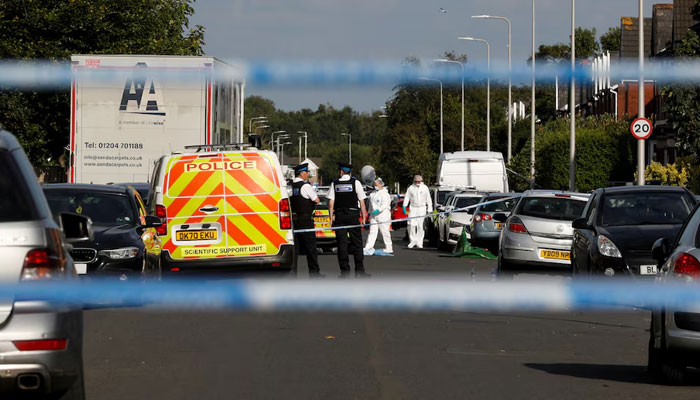 Police work at the scene where a man was arrested after people were stabbed in Southport, Britain, July 29, 2024.— Reuters