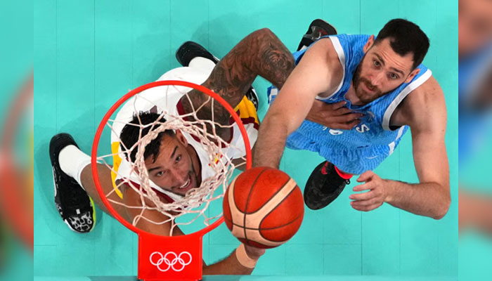 Willy Hernangomez of Spain in action against Georgios Papagiannis of Greece in the mens basketball group match. — Reuters/File