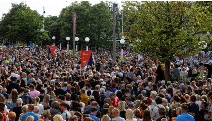 People attend a vigil for the victims of the knife attack in Southport, Britain, July 30, 2024. — Reuters