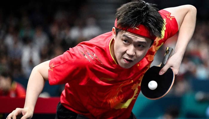 Chinas Wang Chuqin plays a return to Sweden´s Truls Moregard during their men´s table tennis singles round of 32 at the Paris 2024 Olympic Games at the South Paris Arena in Paris on July 31, 2024. — AFP