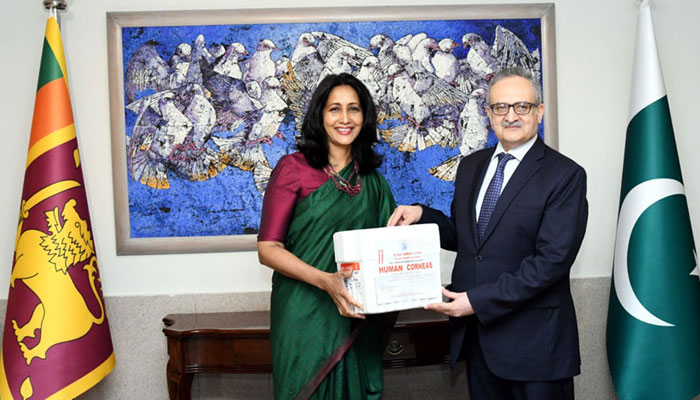 Sri Lankas foreign secretary Aruni Wijewardane poses for a picture with her Pakistani counterpart Syrus Sajjad Qazi on July 31, 2024. — State media