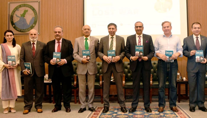 Dignitaries pose for a photo at the book launch of Brigadier (retd) Ishaq Ahmed Khattaks The Last War organised by IRS, in this image released on July 31, 2024. — Facebook @Institute of Regional Studies, Islamabad