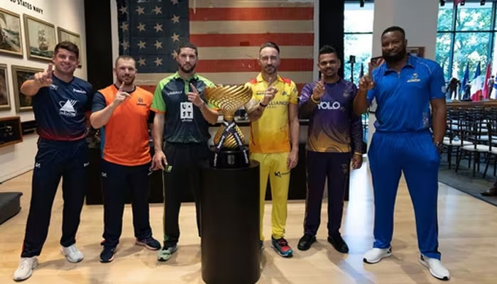 (From left to right): Cricketers Moises Henriques, Aaron Finch, Wayne Parnell, Faf du Plessis, Sunil Narine and Kieron Pollard pose for a photo with the MLC trophy. — X@MLC/File