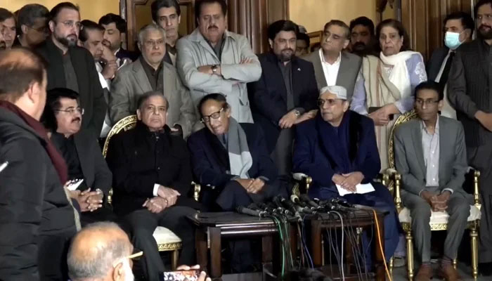 Former chairman Senate Sadiq Sanjrani speaks whereas Prime Minister Shehbaz Sharif, PML-Q chief Chaudhry Shujaat, President Asif Ali Zardari and MQM-P convener Khalid Maqbool Siddiqui sit during a presser. — Facebook/Mian Shehbaz Sharif