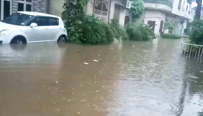 An image of a lane flooded by rainwater in Lahore on August 1, 2024. — reporter