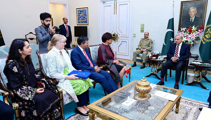 Prime Minister Shehbaz Sharif (right) talking to a five-member delegation led by Commonwealth Secretary General Patricia Scotland (3rd right) here in Islamabad on August 1, 2024. — State media