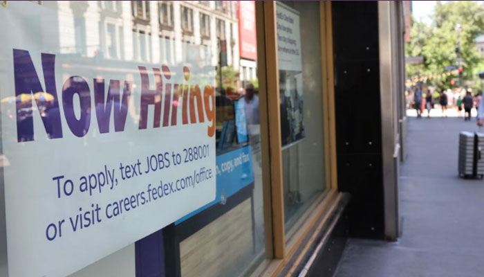 A banner seen outside a shop in US in this undated image. — AFP/file