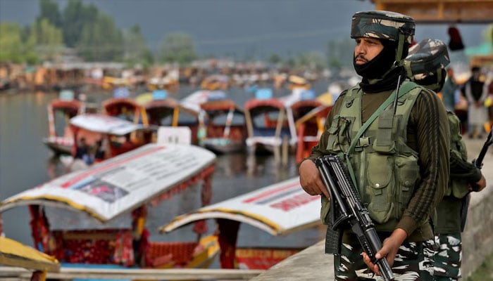 Indias Central Reserve Police Force (CRPF) personnel stand guard on the banks of Dal Lake, a famous tourist attraction, in Srinagar, Indian Illegally Occupied Jammu and Kashmir (IIOJK) on May 26, 2022. — Reuters